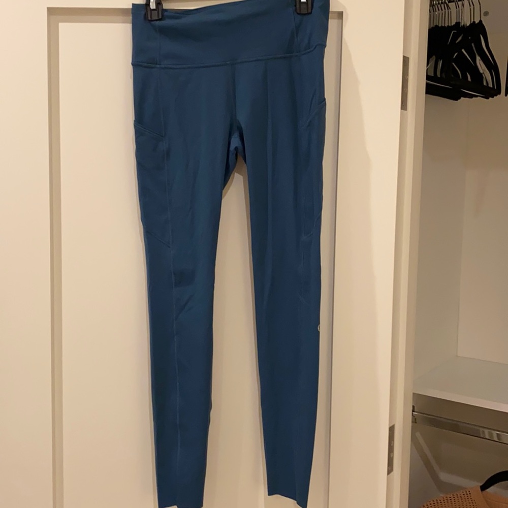 Lululemon barley worn tights, with pockets, size 8.  Beautiful blue color.